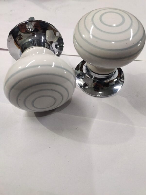 White Ceramic Door Knob with Subtle Grey Concentric Circles